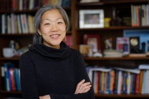 Wake Forest psychology professor Lisa Kiang poses in her Greene Hall office on Tuesday, March 20, 2018.